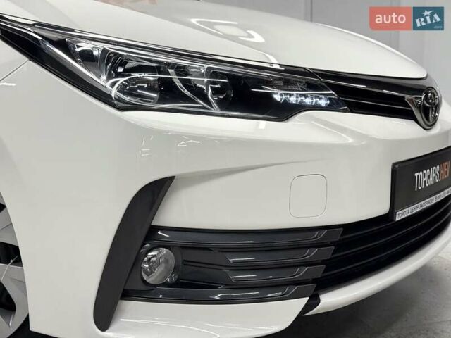 Белый Тойота Королла, объемом двигателя 1.6 л и пробегом 45 тыс. км за 15700 $, фото 16 на Automoto.ua