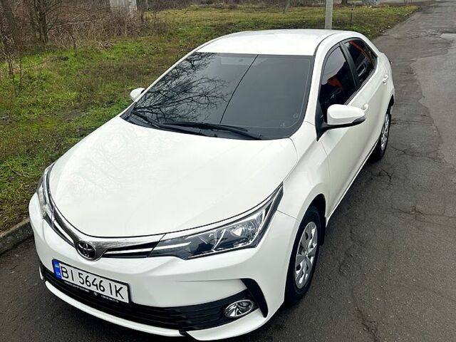 Білий Тойота Королла, об'ємом двигуна 1.6 л та пробігом 205 тис. км за 13700 $, фото 3 на Automoto.ua