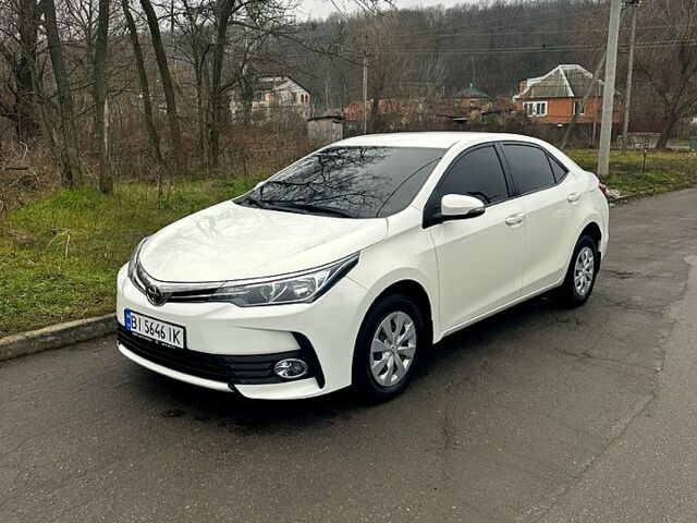 Білий Тойота Королла, об'ємом двигуна 1.6 л та пробігом 205 тис. км за 13700 $, фото 2 на Automoto.ua