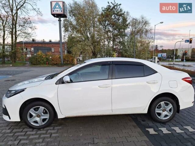 Белый Тойота Королла, объемом двигателя 1.6 л и пробегом 147 тыс. км за 12700 $, фото 6 на Automoto.ua