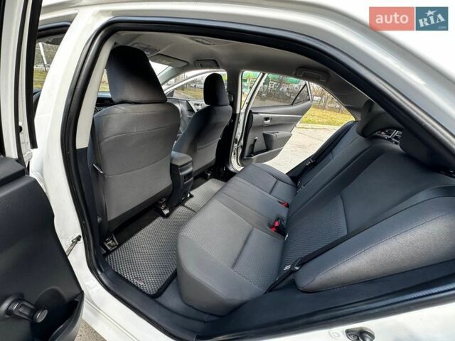 Белый Тойота Королла, объемом двигателя 1.33 л и пробегом 147 тыс. км за 9850 $, фото 32 на Automoto.ua