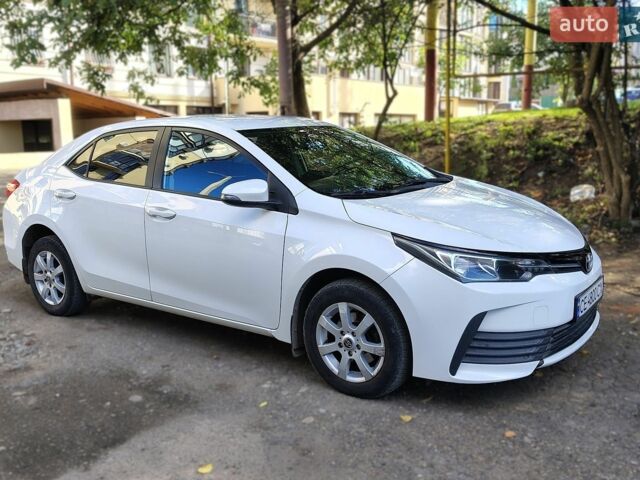 Білий Тойота Королла, об'ємом двигуна 1.33 л та пробігом 130 тис. км за 10800 $, фото 1 на Automoto.ua