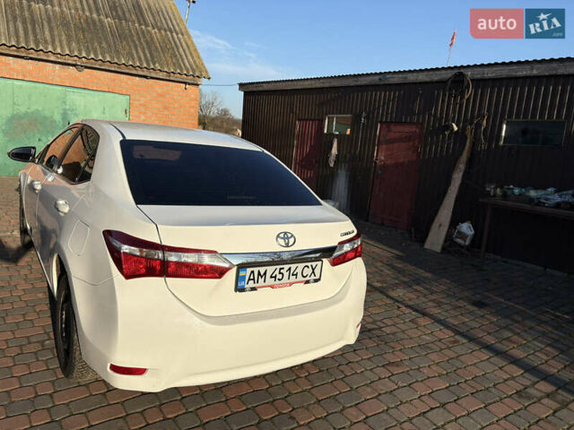 Білий Тойота Королла, об'ємом двигуна 1.33 л та пробігом 147 тис. км за 9500 $, фото 4 на Automoto.ua