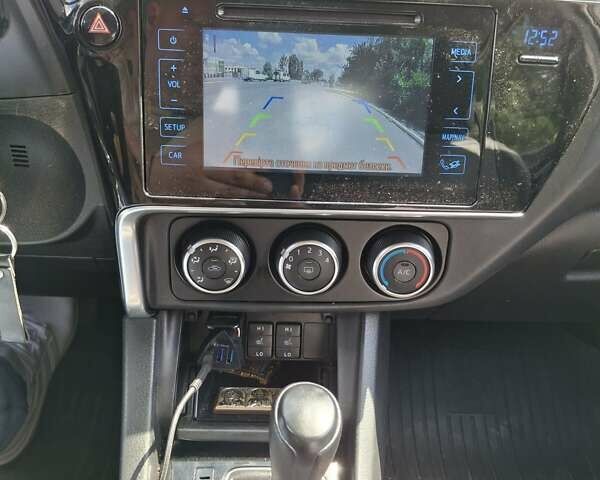 Білий Тойота Королла, об'ємом двигуна 1.6 л та пробігом 190 тис. км за 10900 $, фото 2 на Automoto.ua