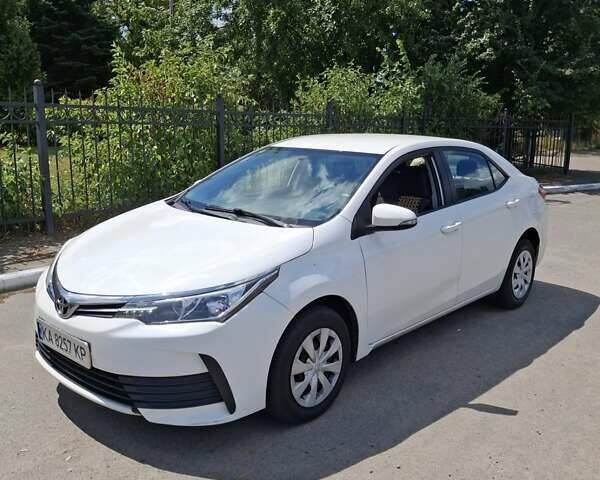 Білий Тойота Королла, об'ємом двигуна 1.6 л та пробігом 190 тис. км за 10900 $, фото 5 на Automoto.ua