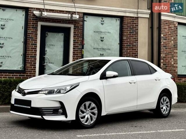 Білий Тойота Королла, об'ємом двигуна 1.6 л та пробігом 45 тис. км за 18000 $, фото 7 на Automoto.ua