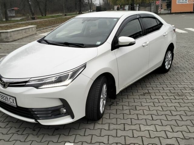 Белый Тойота Королла, объемом двигателя 1.6 л и пробегом 168 тыс. км за 15000 $, фото 1 на Automoto.ua