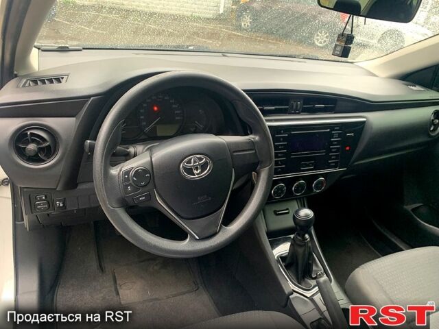 Белый Тойота Королла, объемом двигателя 1.6 л и пробегом 161 тыс. км за 9600 $, фото 7 на Automoto.ua