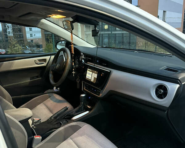 Белый Тойота Королла, объемом двигателя 1.8 л и пробегом 109 тыс. км за 13800 $, фото 8 на Automoto.ua