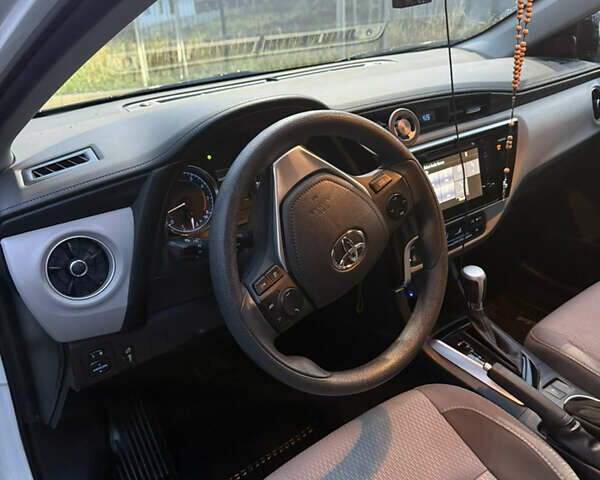Белый Тойота Королла, объемом двигателя 1.8 л и пробегом 109 тыс. км за 13800 $, фото 11 на Automoto.ua