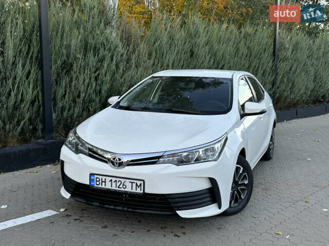 Белый Тойота Королла, объемом двигателя 1.6 л и пробегом 323 тыс. км за 10499 $, фото 4 на Automoto.ua