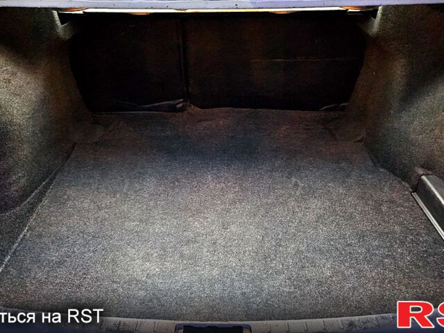 Белый Тойота Королла, объемом двигателя 1.3 л и пробегом 115 тыс. км за 12000 $, фото 9 на Automoto.ua