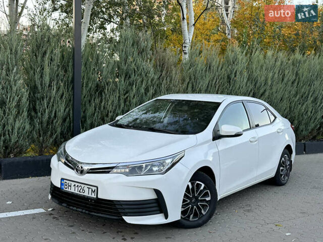 Белый Тойота Королла, объемом двигателя 1.6 л и пробегом 323 тыс. км за 10499 $, фото 5 на Automoto.ua