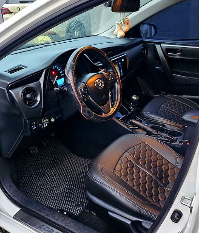 Белый Тойота Королла, объемом двигателя 1.3 л и пробегом 115 тыс. км за 12000 $, фото 7 на Automoto.ua