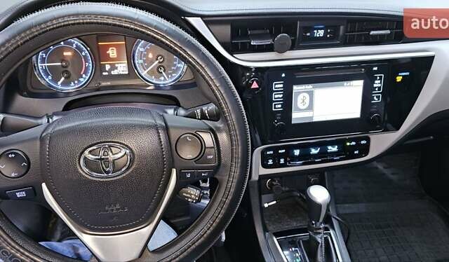 Белый Тойота Королла, объемом двигателя 1.8 л и пробегом 112 тыс. км за 12000 $, фото 2 на Automoto.ua