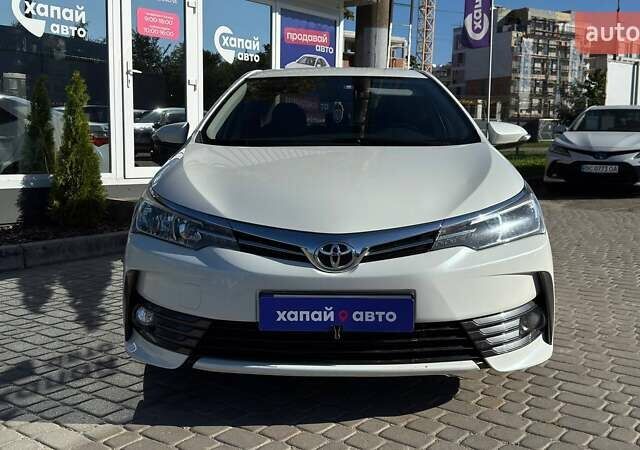 Белый Тойота Королла, объемом двигателя 1.6 л и пробегом 45 тыс. км за 13500 $, фото 1 на Automoto.ua