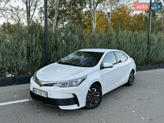 Белый Тойота Королла, объемом двигателя 1.6 л и пробегом 323 тыс. км за 10499 $, фото 1 на Automoto.ua