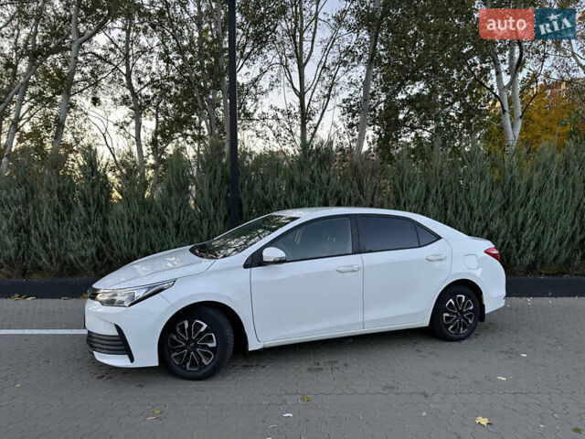 Белый Тойота Королла, объемом двигателя 1.6 л и пробегом 323 тыс. км за 10499 $, фото 6 на Automoto.ua