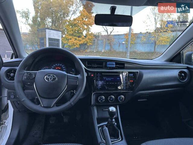 Белый Тойота Королла, объемом двигателя 1.6 л и пробегом 323 тыс. км за 10499 $, фото 24 на Automoto.ua