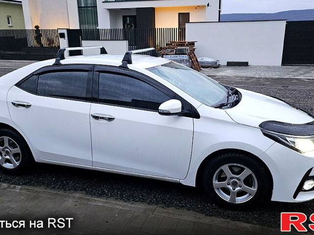 Белый Тойота Королла, объемом двигателя 1.3 л и пробегом 115 тыс. км за 12000 $, фото 2 на Automoto.ua