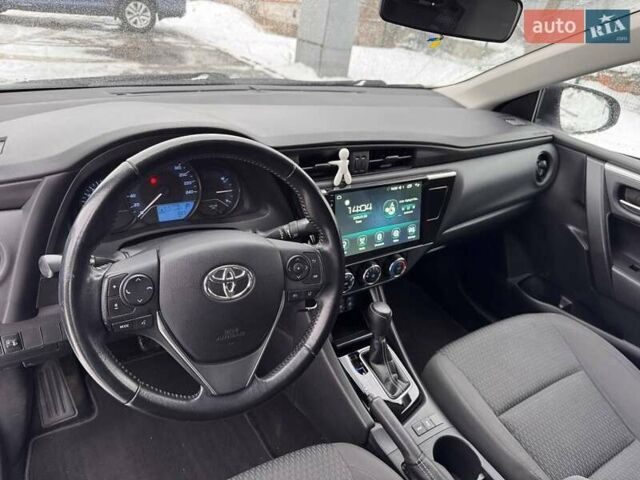 Белый Тойота Королла, объемом двигателя 1.6 л и пробегом 168 тыс. км за 13950 $, фото 19 на Automoto.ua