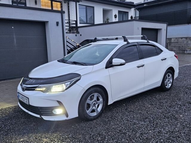 Белый Тойота Королла, объемом двигателя 1.3 л и пробегом 125 тыс. км за 11500 $, фото 5 на Automoto.ua