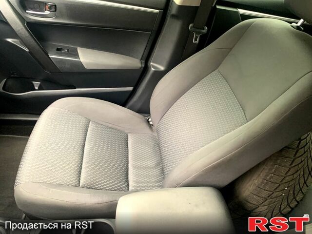 Белый Тойота Королла, объемом двигателя 1.6 л и пробегом 161 тыс. км за 9600 $, фото 9 на Automoto.ua