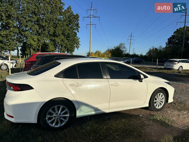 Білий Тойота Королла, об'ємом двигуна 1.6 л та пробігом 125 тис. км за 18000 $, фото 5 на Automoto.ua