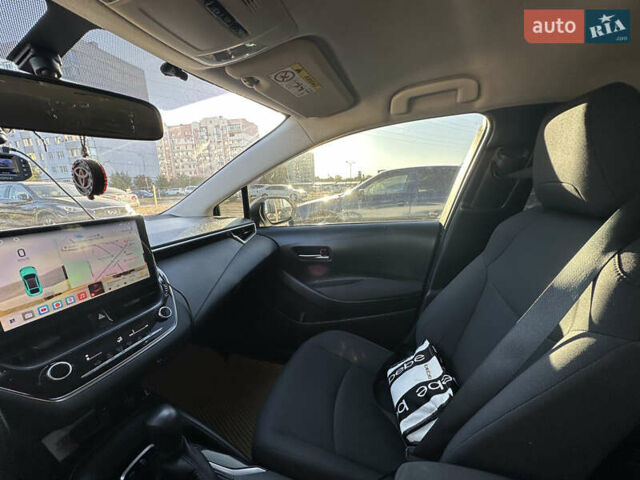 Білий Тойота Королла, об'ємом двигуна 1.6 л та пробігом 125 тис. км за 18000 $, фото 19 на Automoto.ua