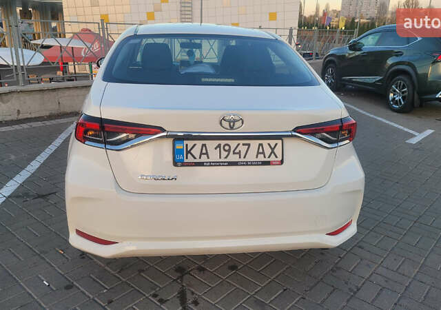 Белый Тойота Королла, объемом двигателя 1.6 л и пробегом 104 тыс. км за 14500 $, фото 1 на Automoto.ua