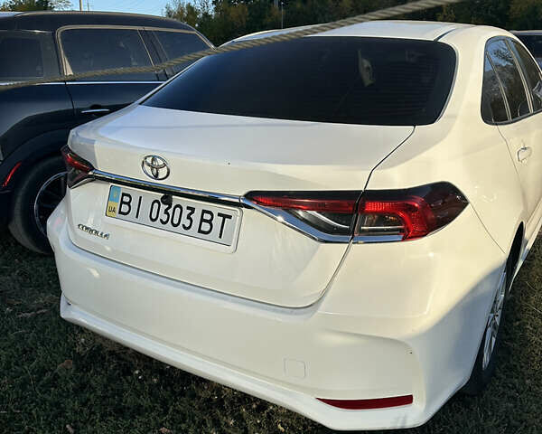 Білий Тойота Королла, об'ємом двигуна 1.6 л та пробігом 125 тис. км за 18000 $, фото 4 на Automoto.ua
