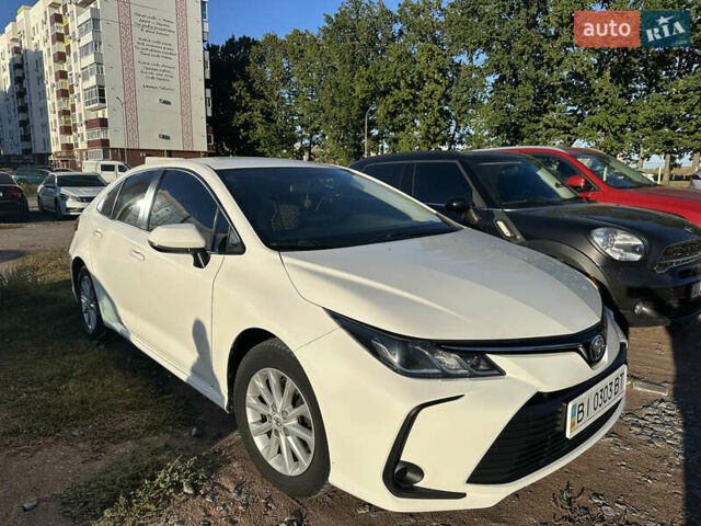 Білий Тойота Королла, об'ємом двигуна 1.6 л та пробігом 125 тис. км за 18000 $, фото 6 на Automoto.ua