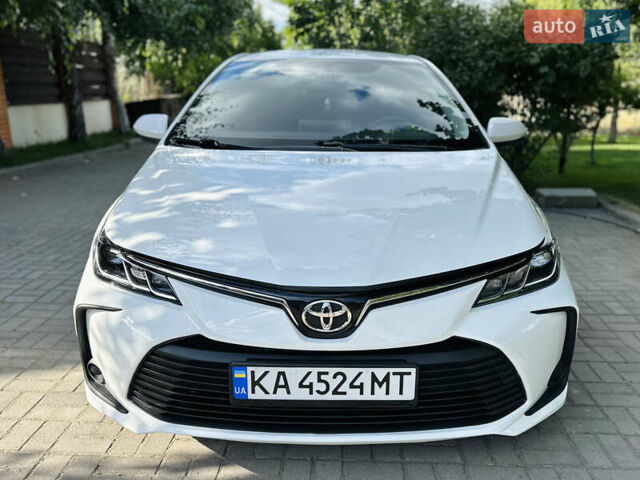 Белый Тойота Королла, объемом двигателя 1.6 л и пробегом 52 тыс. км за 15600 $, фото 5 на Automoto.ua
