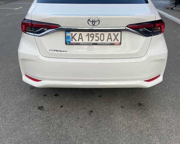 Белый Тойота Королла, объемом двигателя 1.6 л и пробегом 123 тыс. км за 15000 $, фото 7 на Automoto.ua
