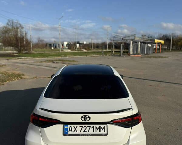 Білий Тойота Королла, об'ємом двигуна 1.8 л та пробігом 170 тис. км за 19500 $, фото 6 на Automoto.ua