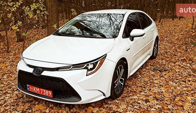 Білий Тойота Королла, об'ємом двигуна 1.8 л та пробігом 169 тис. км за 19900 $, фото 5 на Automoto.ua