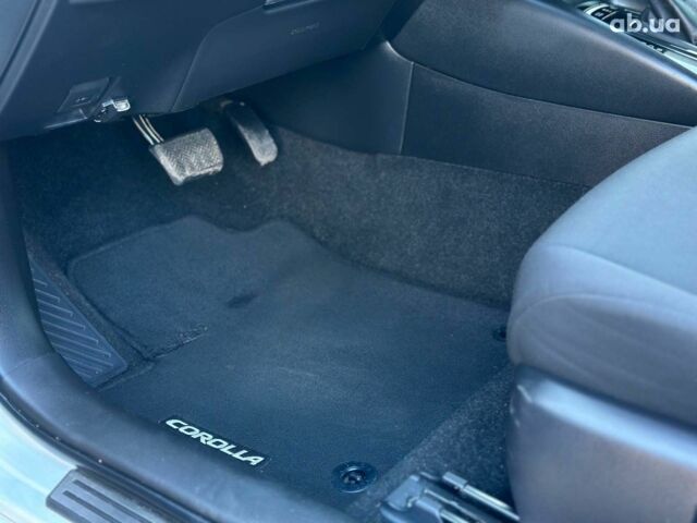 Белый Тойота Королла, объемом двигателя 1.8 л и пробегом 169 тыс. км за 20290 $, фото 9 на Automoto.ua