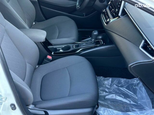 Белый Тойота Королла, объемом двигателя 1.8 л и пробегом 169 тыс. км за 20290 $, фото 23 на Automoto.ua