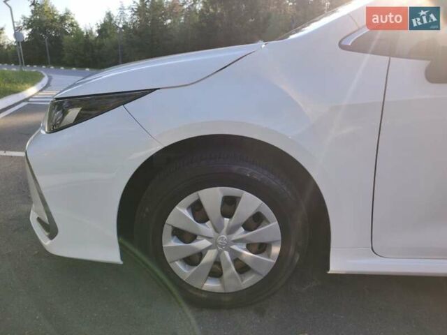 Білий Тойота Королла, об'ємом двигуна 1.6 л та пробігом 95 тис. км за 19300 $, фото 22 на Automoto.ua
