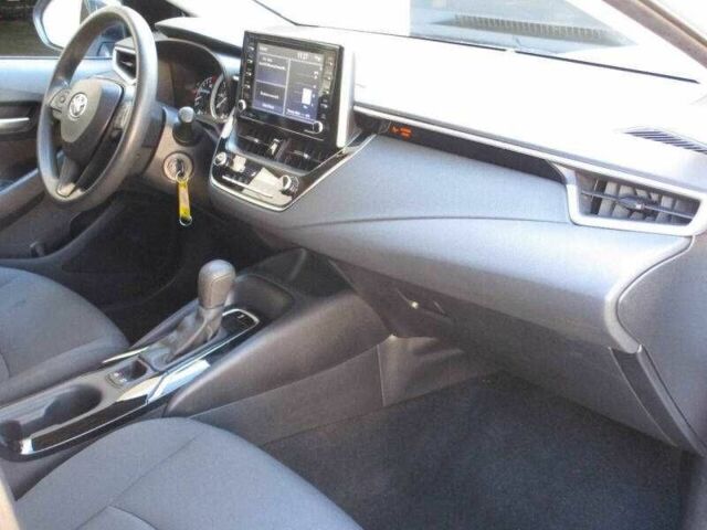 Білий Тойота Королла, об'ємом двигуна 1.8 л та пробігом 32 тис. км за 5000 $, фото 4 на Automoto.ua