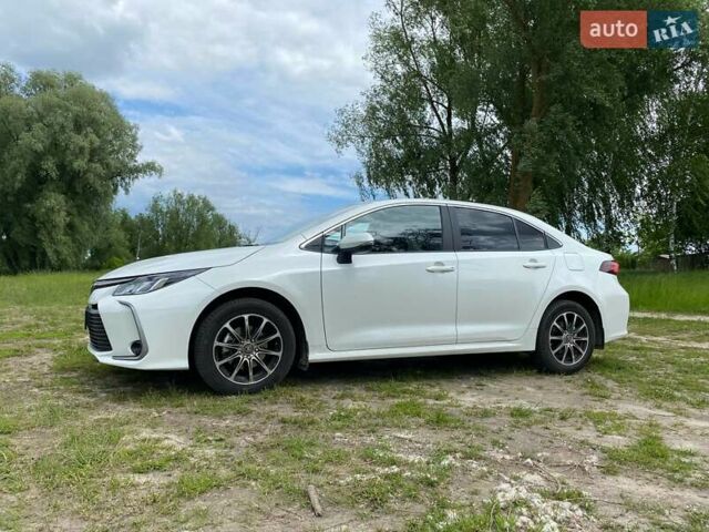 Білий Тойота Королла, об'ємом двигуна 1.6 л та пробігом 77 тис. км за 20000 $, фото 10 на Automoto.ua