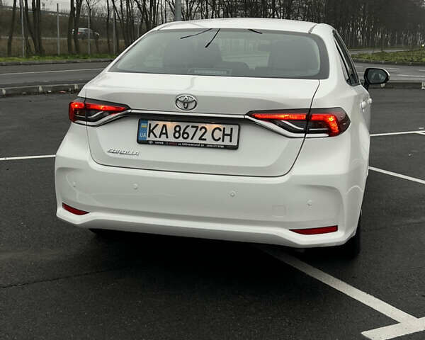 Білий Тойота Королла, об'ємом двигуна 1.6 л та пробігом 107 тис. км за 16500 $, фото 5 на Automoto.ua