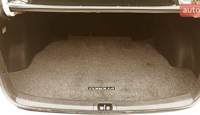 Білий Тойота Королла, об'ємом двигуна 1.8 л та пробігом 169 тис. км за 19900 $, фото 10 на Automoto.ua