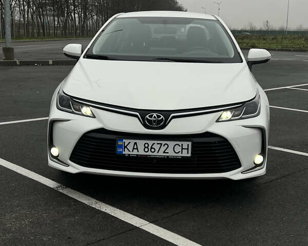 Білий Тойота Королла, об'ємом двигуна 1.6 л та пробігом 107 тис. км за 16500 $, фото 2 на Automoto.ua