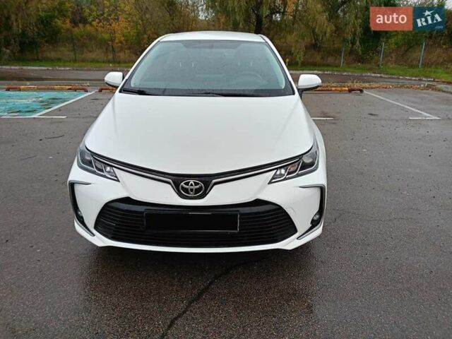 Белый Тойота Королла, объемом двигателя 1.6 л и пробегом 58 тыс. км за 17800 $, фото 2 на Automoto.ua