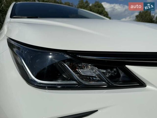 Білий Тойота Королла, об'ємом двигуна 1.6 л та пробігом 2 тис. км за 23800 $, фото 11 на Automoto.ua