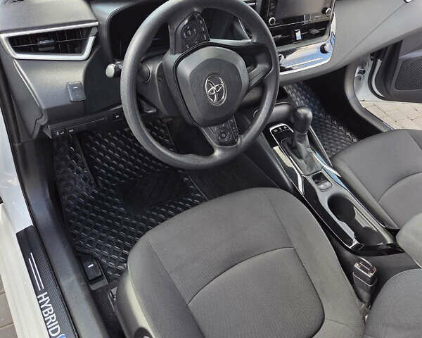 Белый Тойота Королла, объемом двигателя 1.8 л и пробегом 140 тыс. км за 18600 $, фото 13 на Automoto.ua