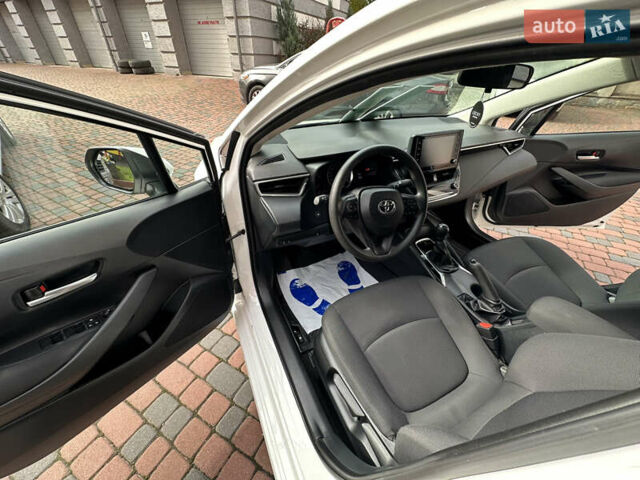 Белый Тойота Королла, объемом двигателя 1.49 л и пробегом 161 тыс. км за 14450 $, фото 119 на Automoto.ua