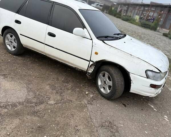 Белый Тойота Королла, объемом двигателя 1.3 л и пробегом 600 тыс. км за 1300 $, фото 1 на Automoto.ua