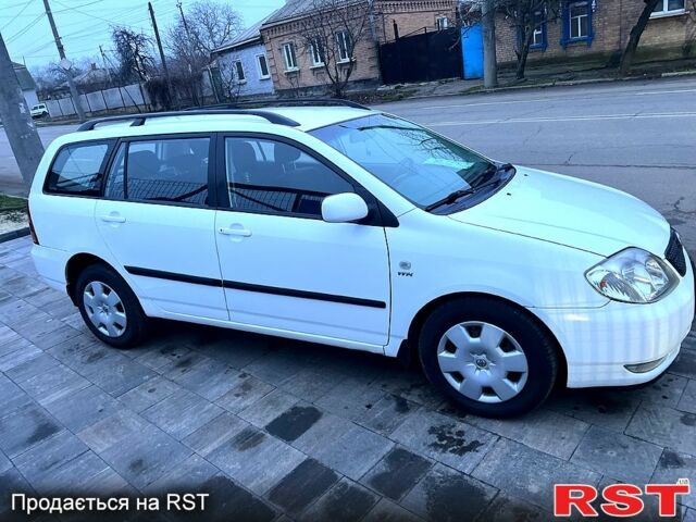 Белый Тойота Королла, объемом двигателя 1.4 л и пробегом 215 тыс. км за 4200 $, фото 2 на Automoto.ua